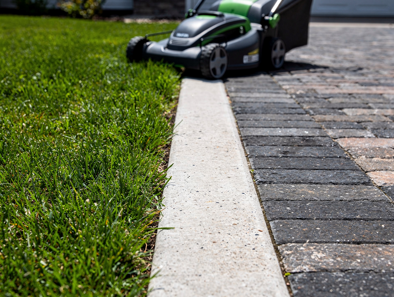 Sharp concrete edging along a walkway